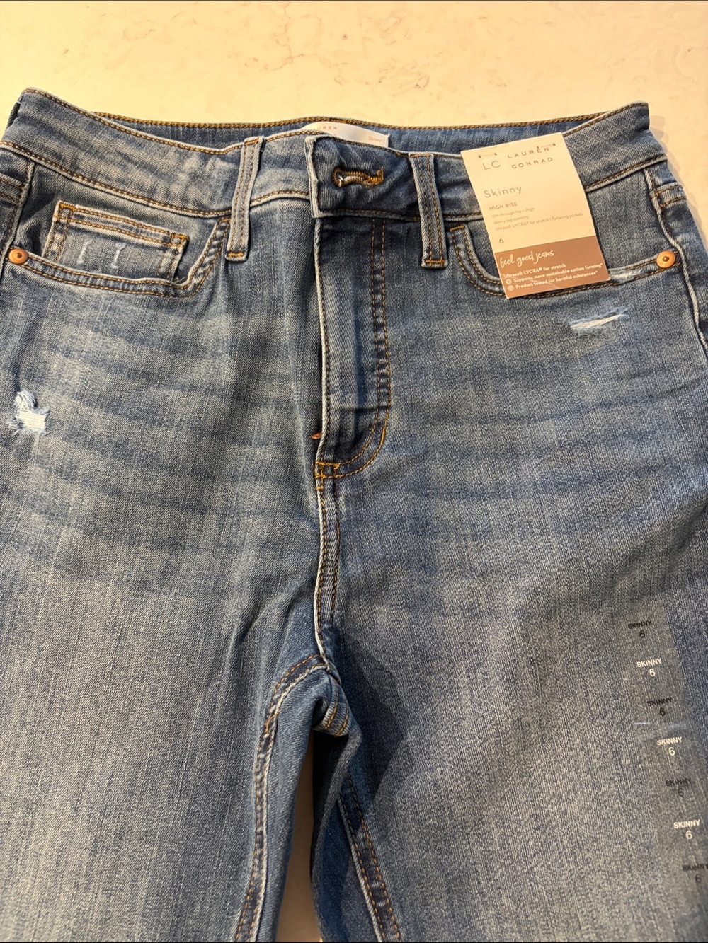 LC Lauren Conrad Light Blue Skinny Jeans with Subtle Distressing
